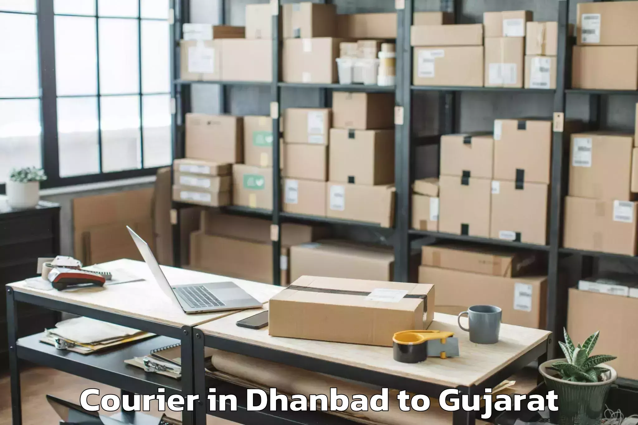 Book Your Dhanbad to Limkheda Courier Today